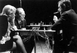 A scene of Duchamp, Teeny, and Cage playing chess, 1968