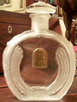 Clear glass Rigaud bottle after washing
with water